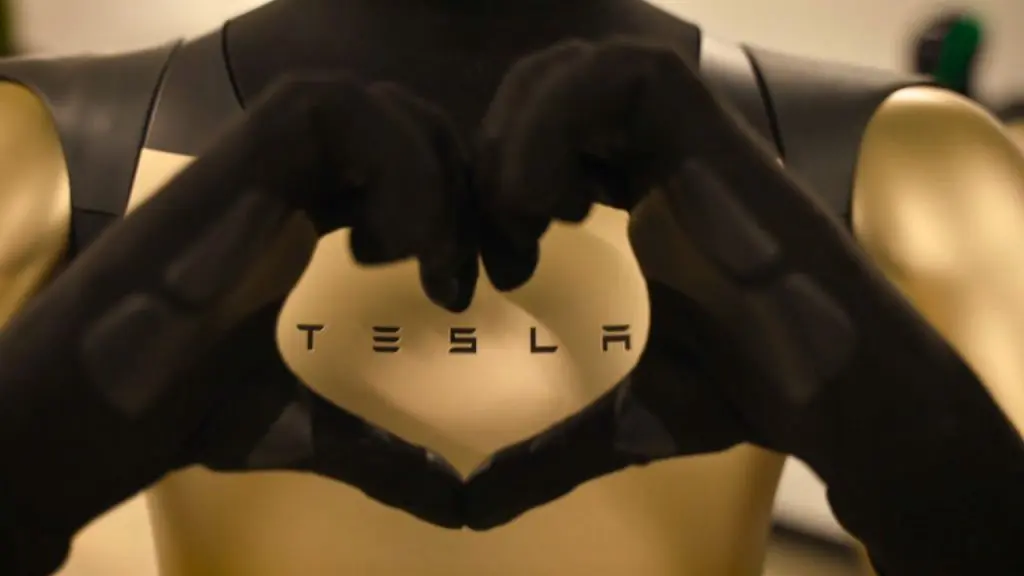 Tesla Optimus makes heart gesture with its robot hands